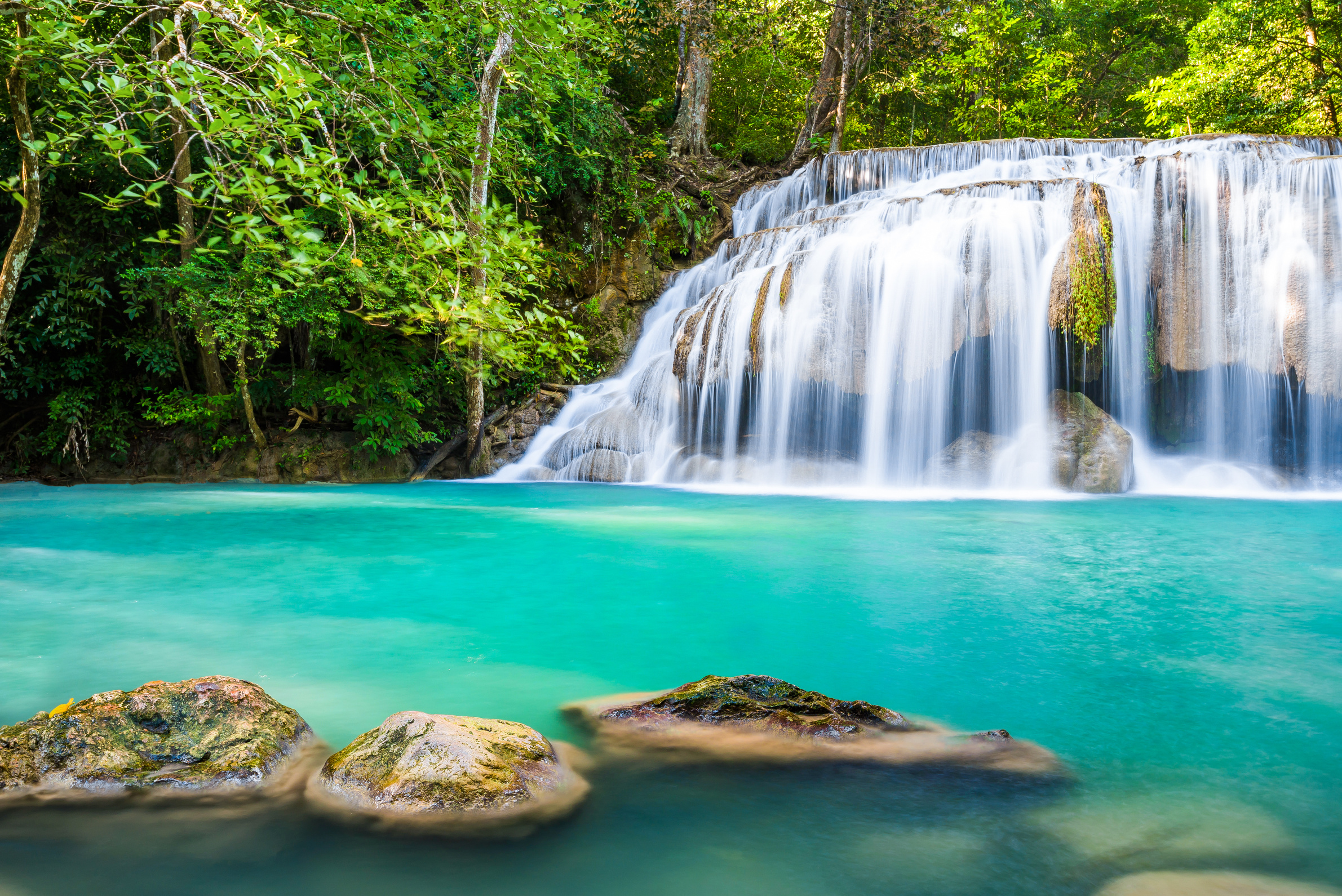 Waterfall and blue emerald water color in Erawan national park.