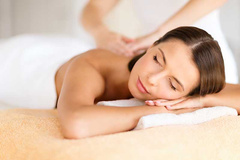 Beautiful Woman in Spa Salon Getting Massage